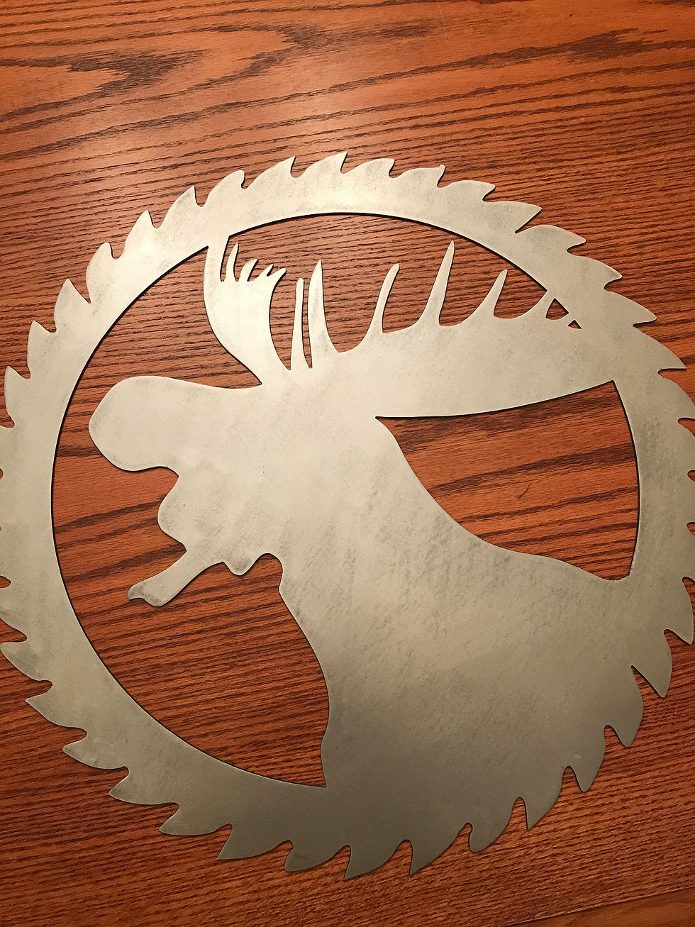 Moose circle saw medallion 