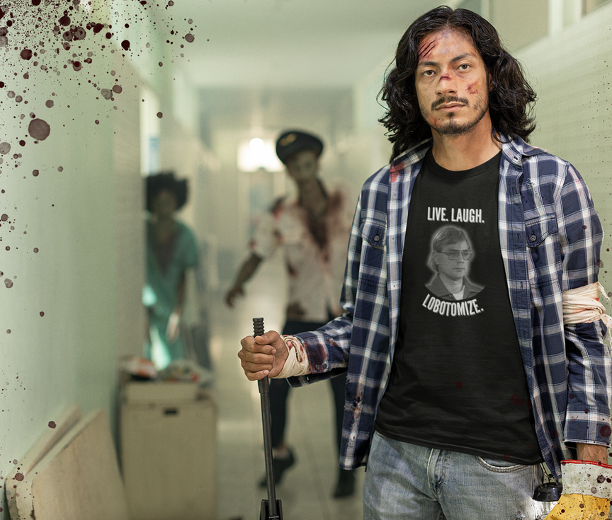 A man fighting zombies wearing a Jeffrey Dahmer tshirt.