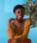Headshot of co-owner, Temi.