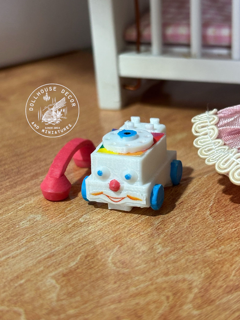 Thumbnail: A coloured toy phone thats been 3d printed