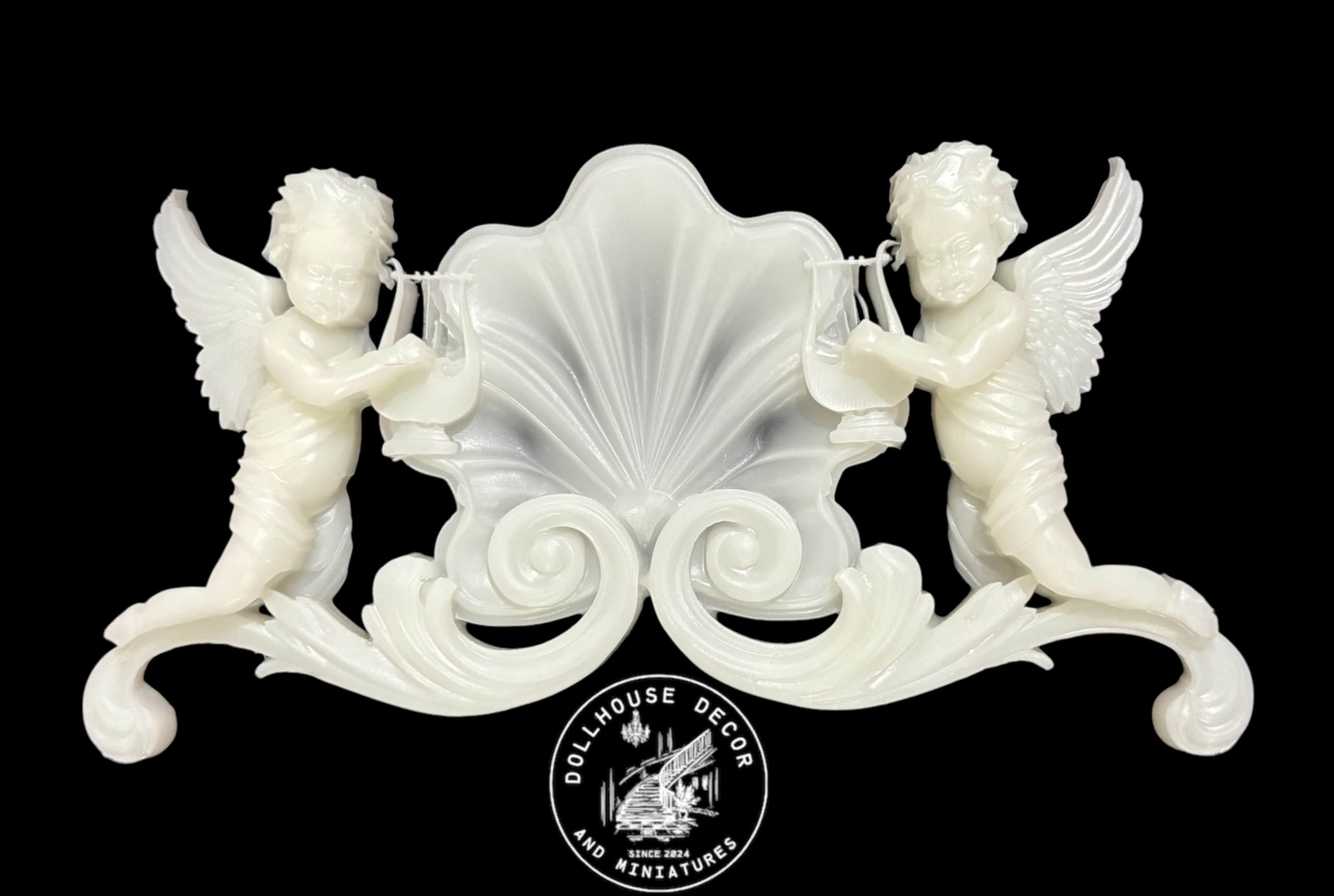 resin cast angel ornament for a dollhouse