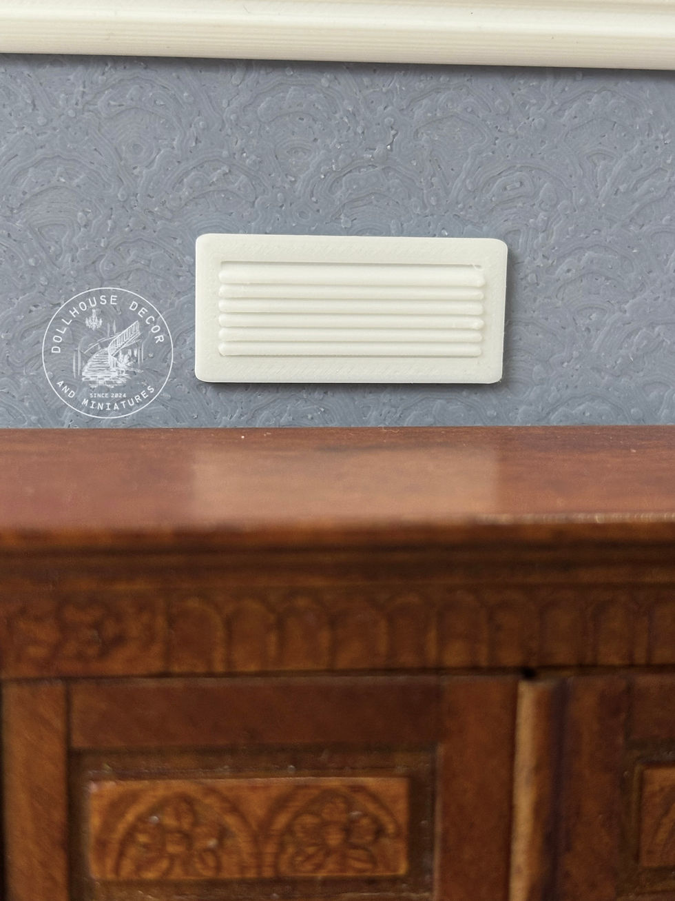 Thumbnail: 1:12 scale miniature wall air vent in white for dollhouse interiors.
