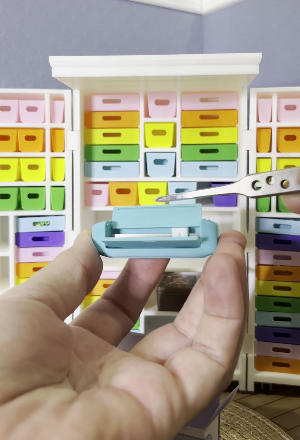 Thumbnail: Video of a 1:12 scale miniature electronic paper cutting machine removed from packaging, lid opened and cutting carriage move