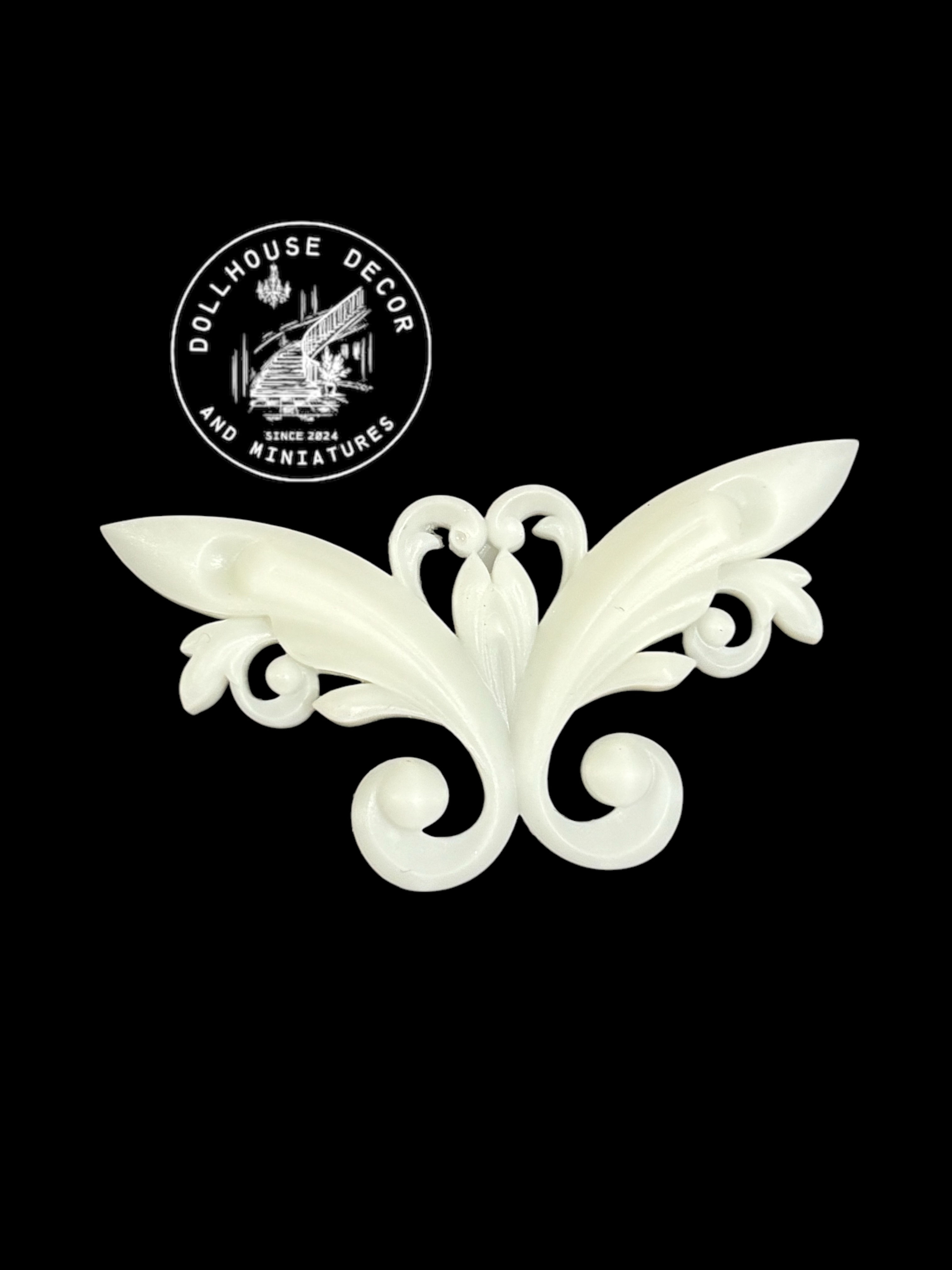 White resin cast butterfly ornament for a dollhouse