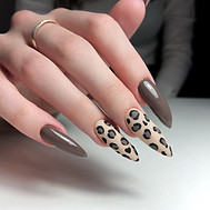 animal print pattern long brown nails beauty salon.jpg