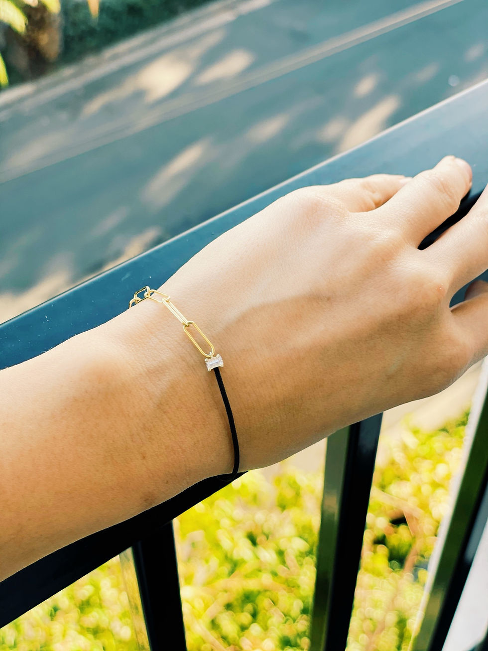 Thumbnail: Half paperclip gold chain and half silk cord bracelet with G/H cut diamond at the center. Choose your custom diamond cut.