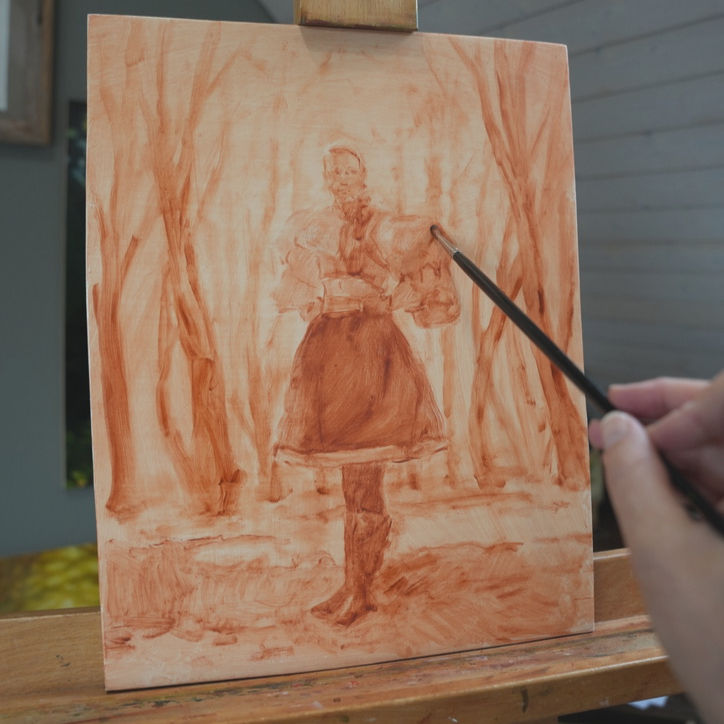 Applying the first layer of paint to the prepared panel