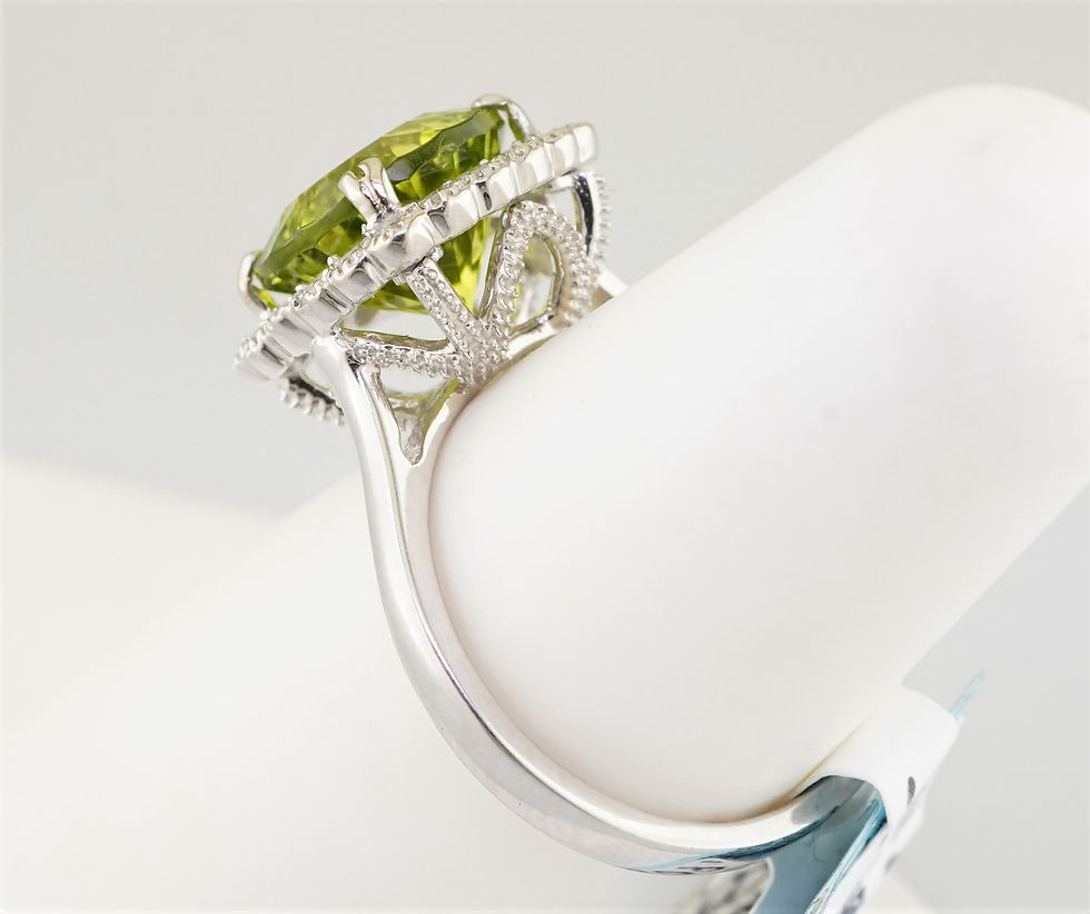 Thumbnail: 14k peridot and natural diamond halo style ring
