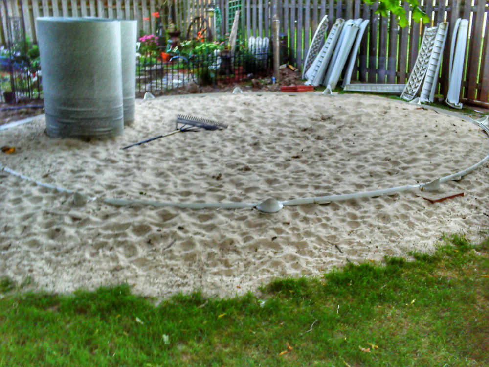 how much sand under above ground pool