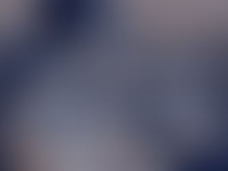 Person in cozy sweater using a laptop on a patterned rug. Text overlay reads, "Find Your Soul Work Through Your Midheaven." Modern, serene setting.