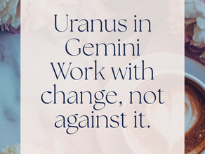 Text "Uranus in Gemini, work with change, not against it" over marble background with pink peonies and a latte. Mood: reflective.