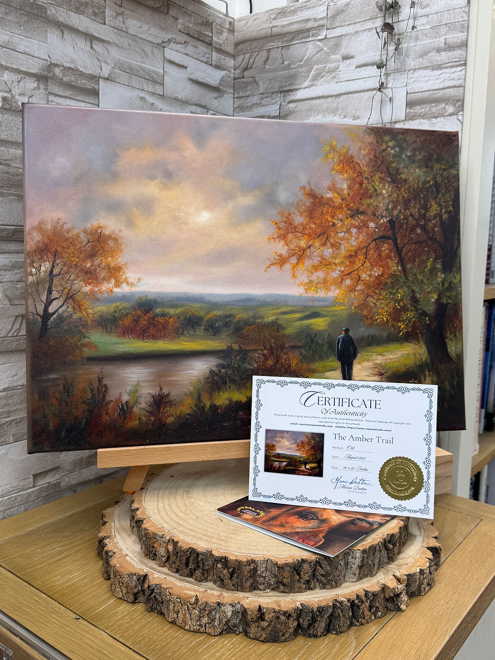 Thumbnail: Autumn landscape with figure walking beside a river, original oil painting with warm amber tones by Marion Dutton