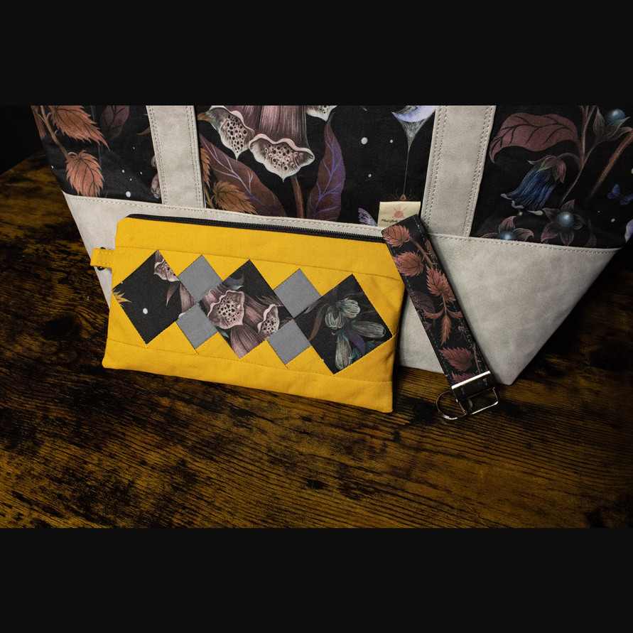 phat girlz fibre night shade wonderlust tote stock photo