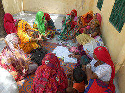 Women at Barwarw vill. to do SHG meeting self
