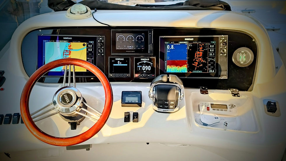 Azimut Intermarine 600 helm after a retrofit, with Simrad displays and integrated instruments.