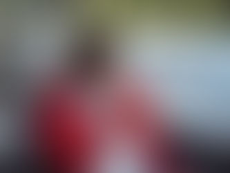 Sailboat at anchor using onboard internet equipment in European coastal waters