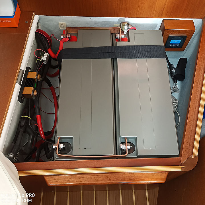 Sailboat cabin with electrical control panel and charging system