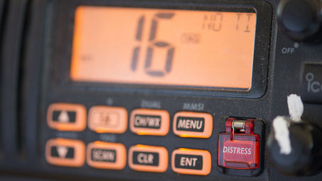 Sailboat cockpit with VHF radio used for international cruising communication