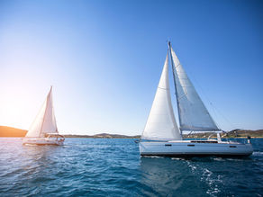 Solar panels charging batteries on a cruising sailboat