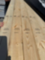 Stacked premium lumber at the Wyatt Bell gallery.