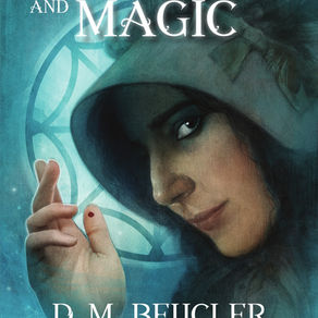 A woman in a hooded cloak with a mysterious gaze touches her fingertip, set against a blue mystical background with ornate text: Memory and Magic by D.M. Beucler.