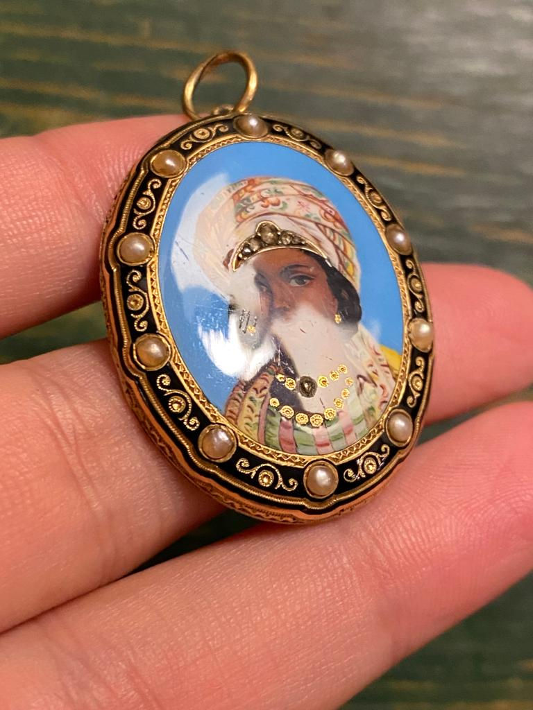 Thumbnail: Enamel Locket Front Of A Black Woman