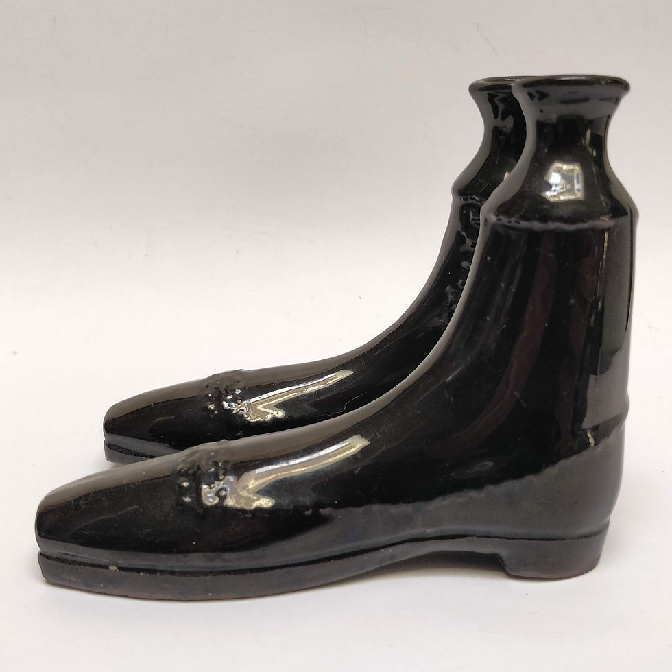 Thumbnail: A Pair Of C19th Treacle-Glazed Boot Flasks