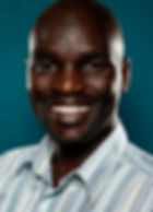 Smiling man in striped shirt
