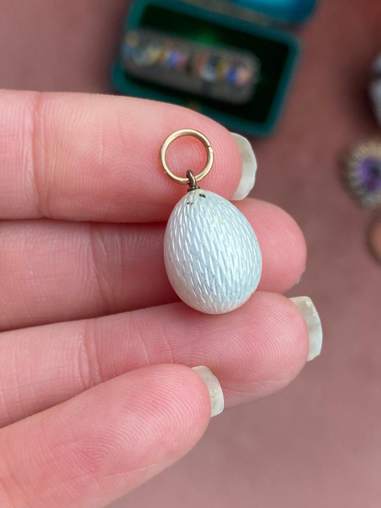 Thumbnail: Snow White Guilloche Enamelled Egg Pendant
