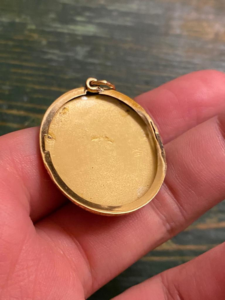 Thumbnail: Enamel Locket Front Of A Black Woman