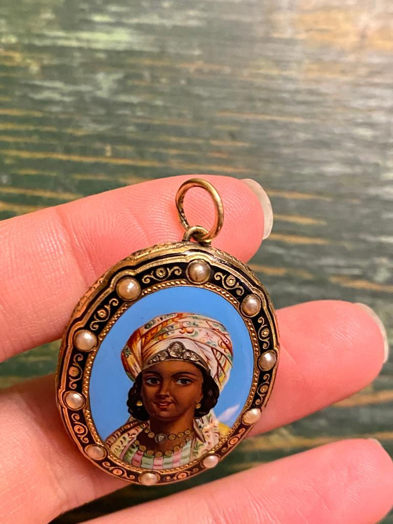 Thumbnail: Enamel Locket Front Of A Black Woman