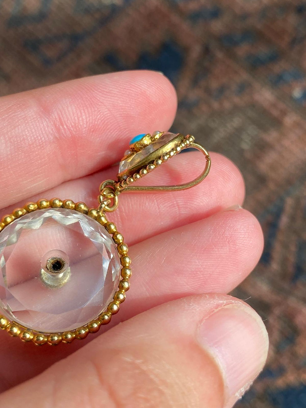 Thumbnail: Circle Of Rock Crystal Dangling From Matching Bale, Both Studded With Turquoise