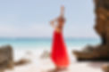 full-length-portrait-elegant-european-woman-smiling-near-ocean-stunning-tanned-girl-red-po