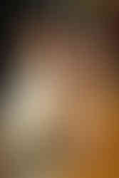 Smiling couple at their mehndi ceremony in Uttarakhand wearing coordinated yellow and green outfits