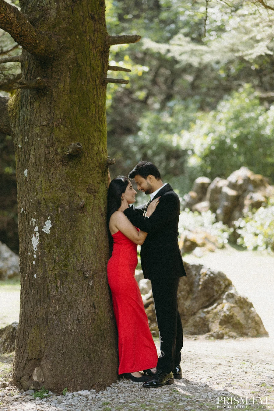 romantic couple pre wedding shoot in mussoorie forest near tree candid intimate moment