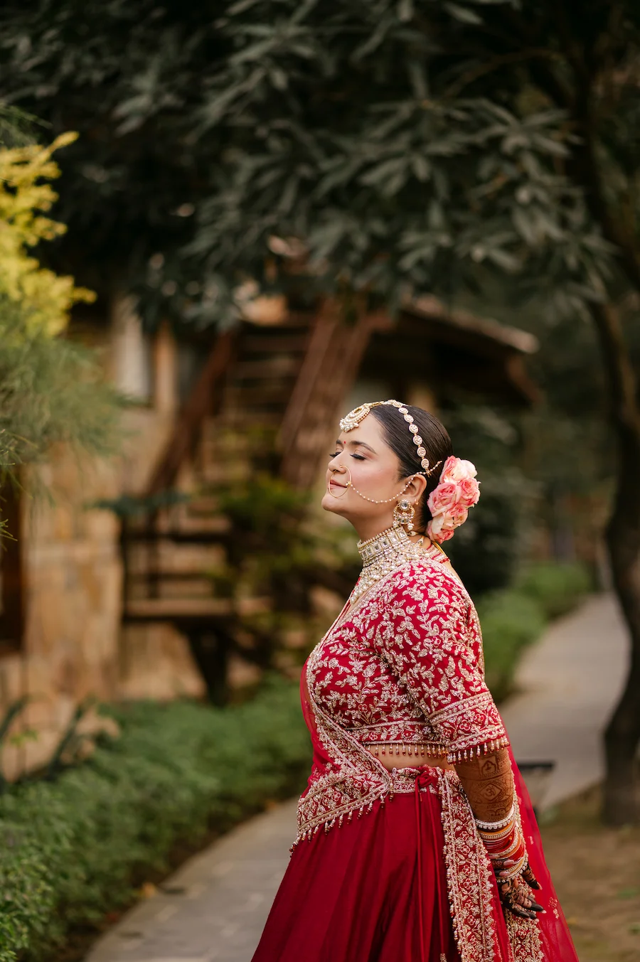 Indian bride portrait during destination wedding in Uttarakhand with elegant bridal look