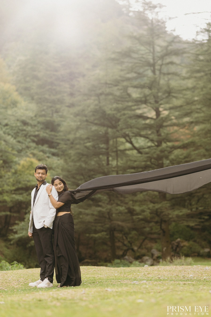 cinematic pre wedding shoot couple in mussoorie forest with flowing fabric and natural light