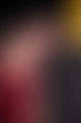 Couple sharing a romantic moment in glamorous attire at a cocktail party in Dehradun.