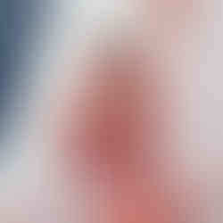 Smiling bride in traditional attire during wedding ceremony, Dehradun, India.