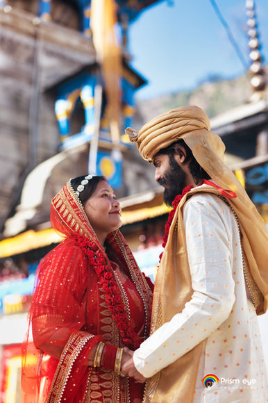 Couple in traditional wedding attire