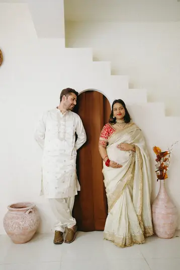 minimal studio maternity shoot with arch background rishikesh