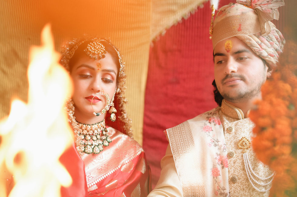 Couple at a traditional Indian wedding ceremony; Wedding Planners; Prismeyeproductions