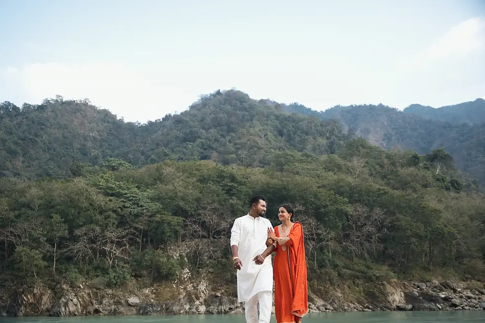 candid couple pre wedding shoot near ganga river in rishikesh with natural romantic moment