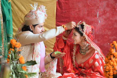 Beautiful wedding atmosphere at Triyuginarayan Temple in Uttarakhand, featuring traditional Hindu wedding rituals with the ancient temple and Himalayan mountains in the background, capturing the sacred and serene vibes of Lord Shiva and Parvati’s divine wedding venue
