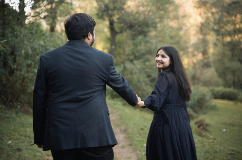 Candid pre-wedding portrait in Mussoorie pine trails inspired by Camel’s Back and Landour aesthetics