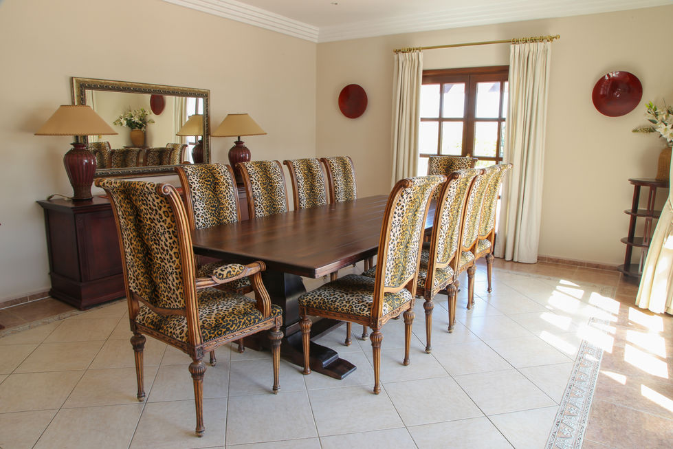 Elegant dining area with views of the sprawling gardens