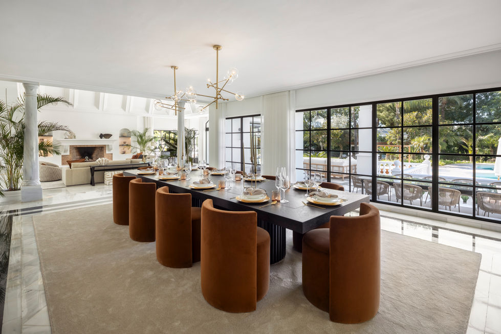 Dining Area: The sophisticated dining area seamlessly connected to the living room.