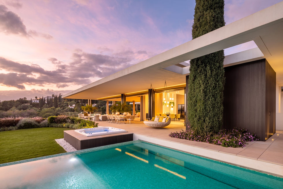 a large house with a swimming pool and a jacuzzi