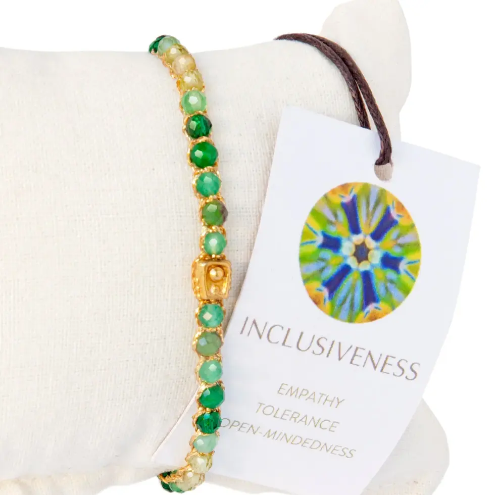 Green and gold beaded Inclusiveness Bracelet Gold, "INCLUSIVENESS" tag.