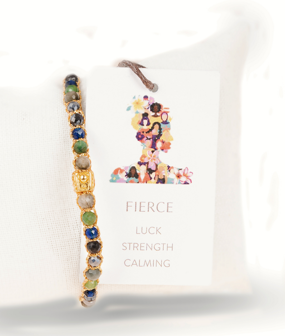 Colorful gemstone bracelet with tag displaying FIERCE LUCK STRENGTH CALMING.